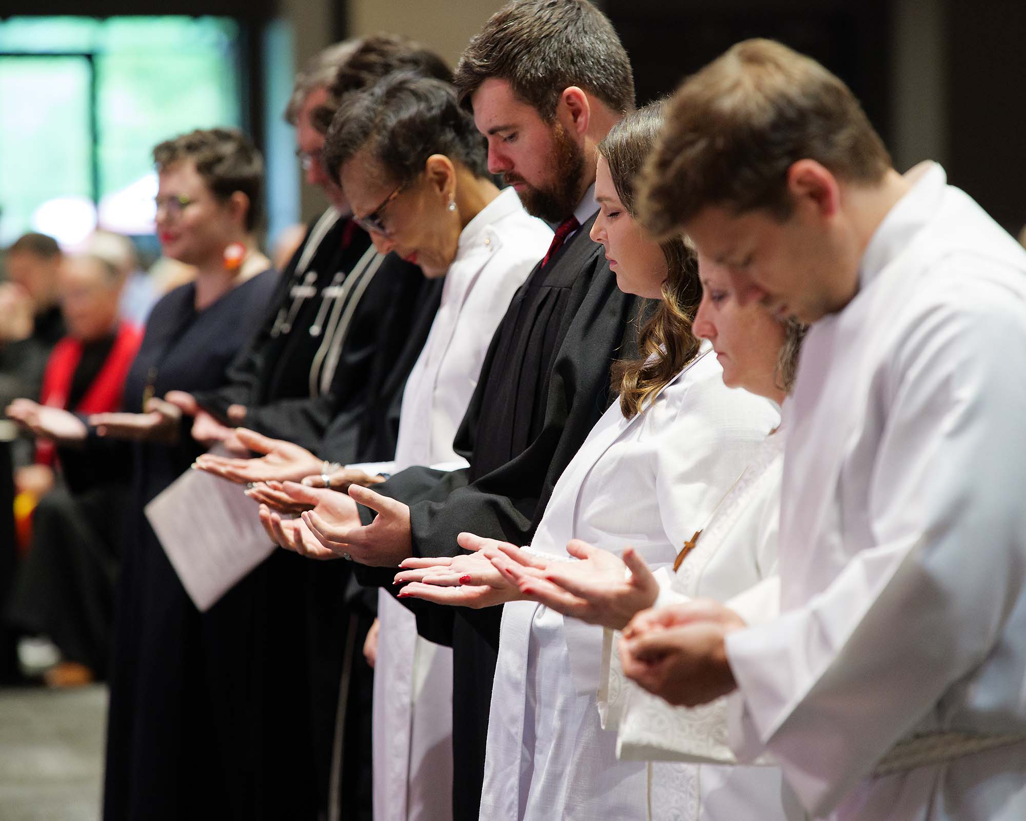 Commissioned Elders praying