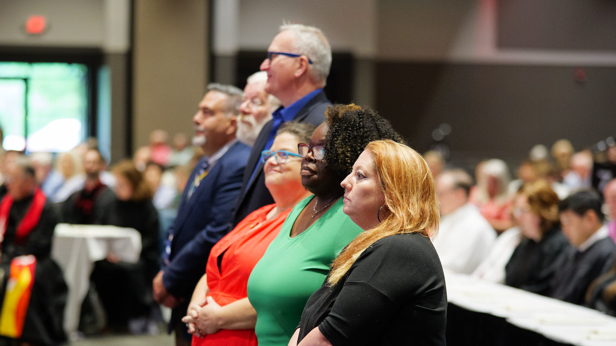 Newly certified CLMs standing in a line ready to affirm their commitment during the Ordering for Ministry Service.