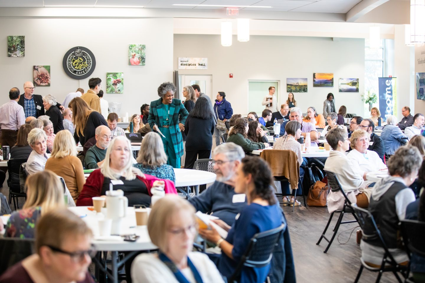 Several tables of participants