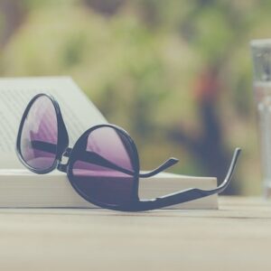 book with sunglasses
