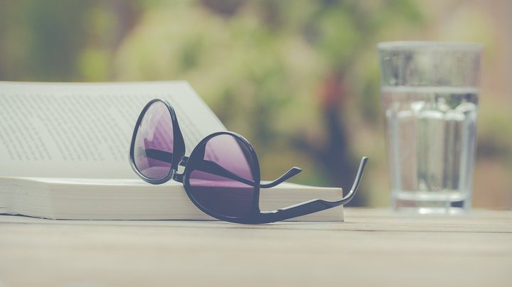 book with sunglasses
