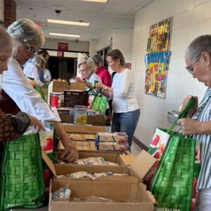 Centenary UMC volunteers pack food bags