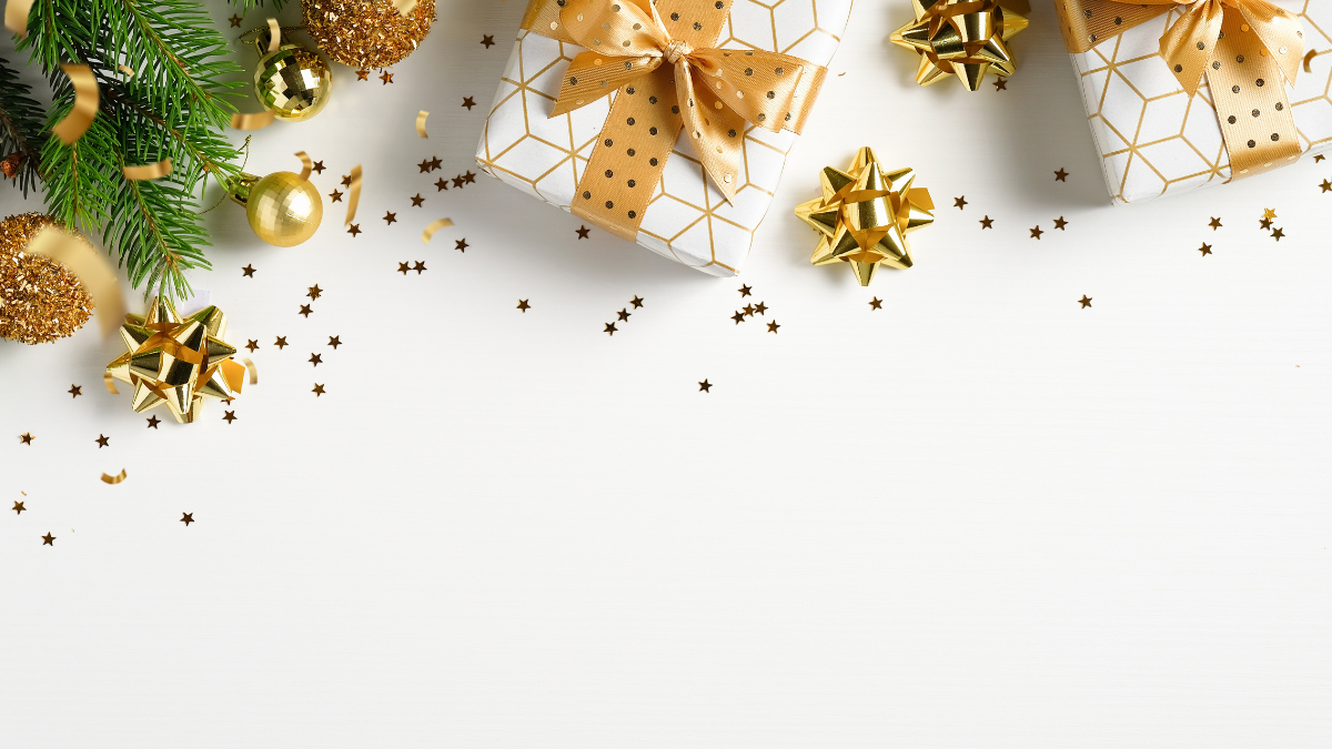 Gold and white Christmas presents on white background