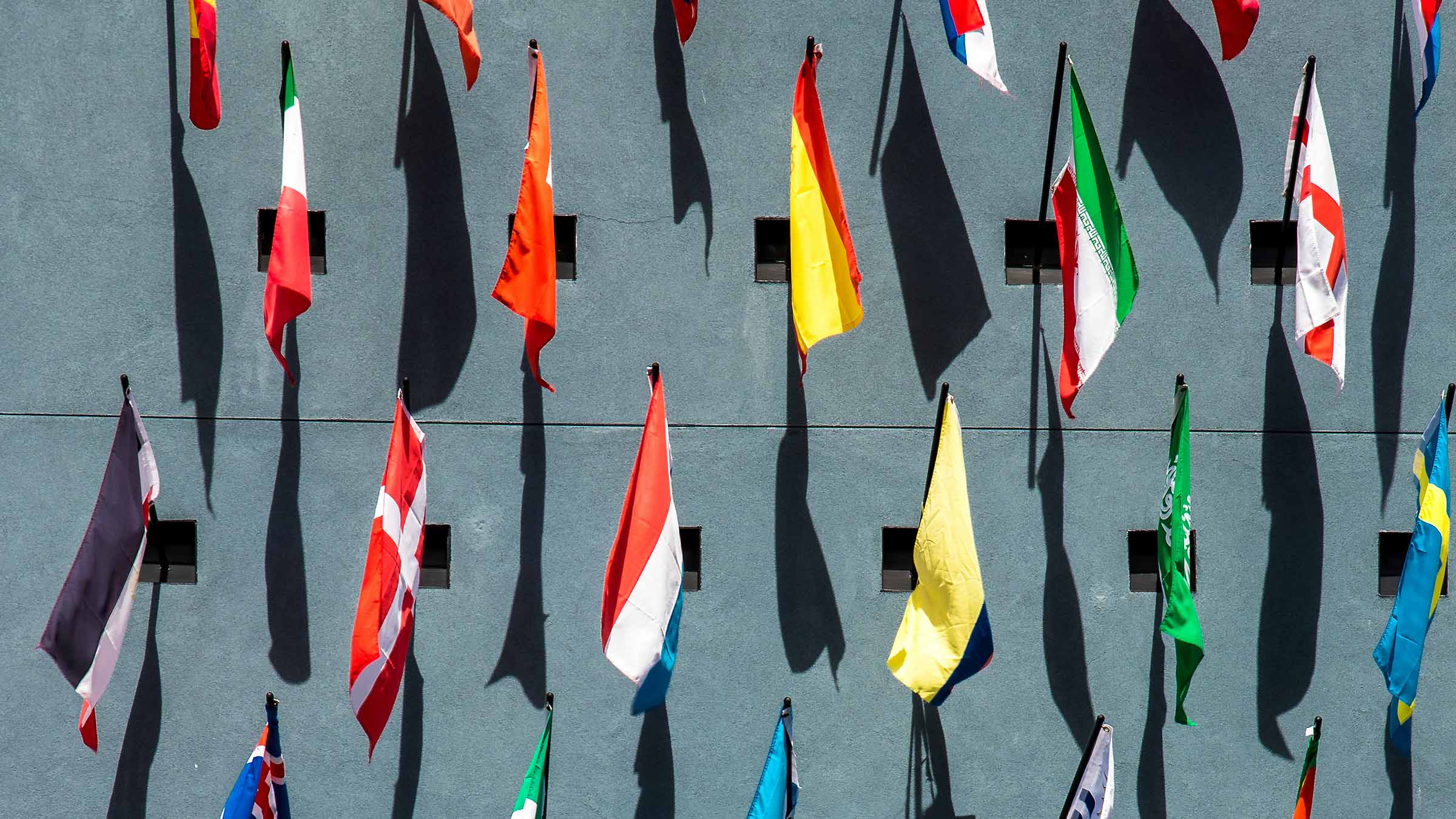 Flags from above with shadows pointing down