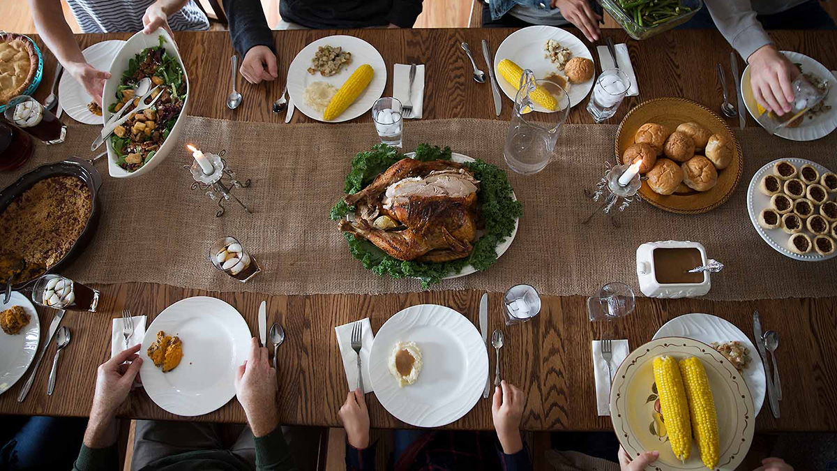 Overhead view of a table with plates and food