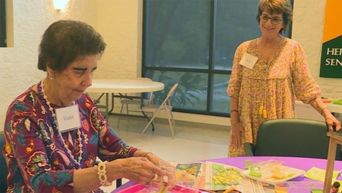 Dementia respite program at Trinity UMC paints flowers for MumFest